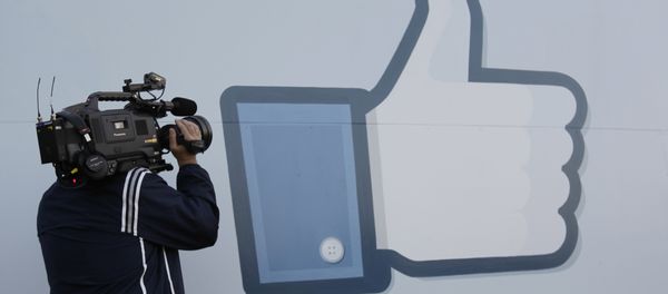 A television photographer shoots the Like sign outside of Facebook headquarters in Menlo Park, Calif - Sputnik International