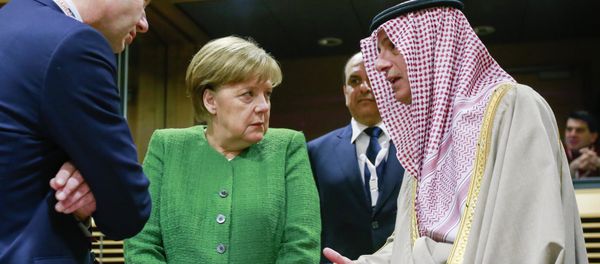 Germany's Chancellor Angela Merkel (C) speaks with Saudi-Arabia's Foreign Minister Adel al-Jubeir (R) as they arrive to attend a High Level Conference on the Sahel at the European Commission in Brussels on February 23, 2018 Germany's Chancellor Angela Merkel (C) speaks with Saudi-Arabia's Foreign Minister Adel al-Jubeir (R) as they arrive to attend a High Level Conference on the Sahel at the European Commission in Brussels on February 23, 2018 - Sputnik International