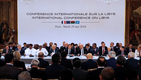 A view shows an international conference on Libya with Libyan leaders, heads of the states sharing borders with the country, European represent and French President Emmanuel Macron at the Elysee Palace in Paris, France, May 29, 2018 A view shows an international conference on Libya with Libyan leaders, heads of the states sharing borders with the country, European represent and French President Emmanuel Macron at the Elysee Palace in Paris, France, May 29, 2018 - Sputnik International