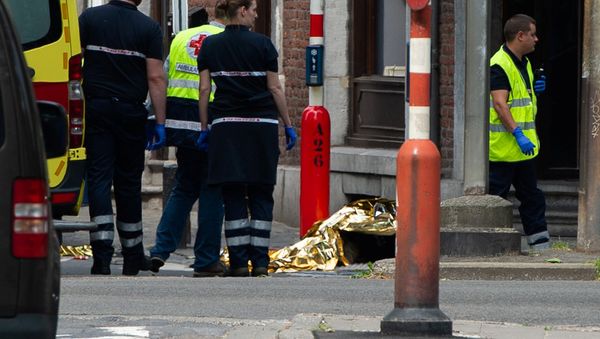 Rescuers are seen following a shooting in Liege, Belgium, May 29, 2018 - Sputnik International