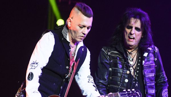 Actor Johnny Depp, left, and American rock musician Alice Cooper during a performance at the Olimpiysky sports complex Actor Johnny Depp, left, and American rock musician Alice Cooper during a performance at the Olimpiysky sports complex - Sputnik International