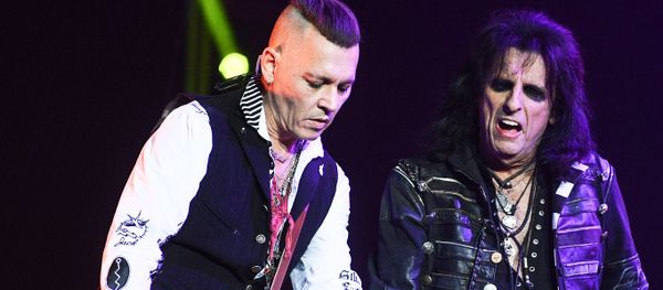 Actor Johnny Depp, left, and American rock musician Alice Cooper during a performance at the Olimpiysky sports complex Actor Johnny Depp, left, and American rock musician Alice Cooper during a performance at the Olimpiysky sports complex - Sputnik International