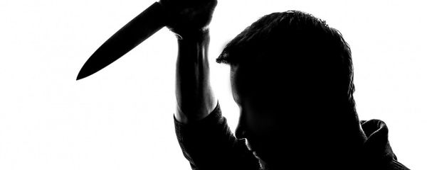 A silhouette of a man holding a knife A silhouette of a man holding a knife - Sputnik International