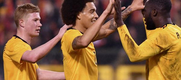 Belgium's Romelu Lukaku (right) is congratulated by team-mates Kevin de Bruyne (left) and Axel Witsel after scoring during a friendly in March 2018 - Sputnik International