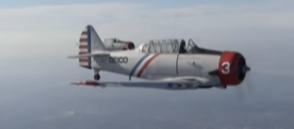 Geico Skytypers' WWII SNJ-2 plane Geico Skytypers' WWII SNJ-2 plane - Sputnik International