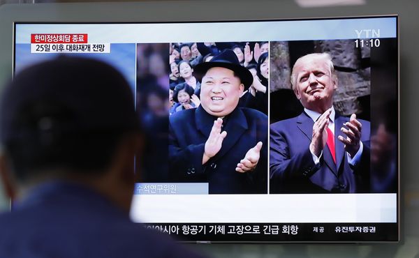 A man watches a TV screen showing file footage of U.S. President Donald Trump, right, and North Korean leader Kim Jong Un, left, during a news program at the Seoul Railway Station in Seoul, South Korea, Wednesday, May 23, 2018 A man watches a TV screen showing file footage of U.S. President Donald Trump, right, and North Korean leader Kim Jong Un, left, during a news program at the Seoul Railway Station in Seoul, South Korea, Wednesday, May 23, 2018 - Sputnik International