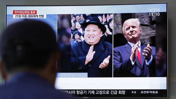 A man watches a TV screen showing file footage of US President Donald Trump, right, and North Korean leader Kim Jong-un, left, during a news program at the Seoul Railway Station in Seoul, South Korea, May 23, 2018 A man watches a TV screen showing file footage of US President Donald Trump, right, and North Korean leader Kim Jong-un, left, during a news program at the Seoul Railway Station in Seoul, South Korea, May 23, 2018 - Sputnik International