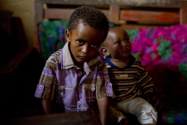 In this photo taken Aug. 10, 2016, 8-year-old Michael sits at his mother's house in the Congo Ituri province capital Bunia. Michael has never met his father, and only knows that he was a foreigner from one of the peacekeeping missions in the country. In this photo taken Aug. 10, 2016, 8-year-old Michael sits at his mother's house in the Congo Ituri province capital Bunia. Michael has never met his father, and only knows that he was a foreigner from one of the peacekeeping missions in the country. - Sputnik International
