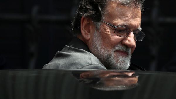 Spain's Prime Minister Mariano Rajoy gets into his car during a lunch break in a motion of no confidence debate at Parliament in Madrid, Spain, May 31, 2018 - Sputnik International