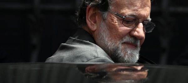 Spain's Prime Minister Mariano Rajoy gets into his car during a lunch break in a motion of no confidence debate at Parliament in Madrid, Spain, May 31, 2018 Spain's Prime Minister Mariano Rajoy gets into his car during a lunch break in a motion of no confidence debate at Parliament in Madrid, Spain, May 31, 2018 - Sputnik International