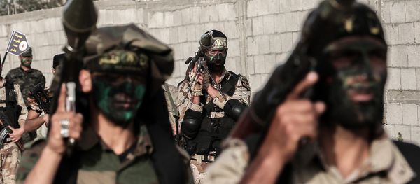 Members of the Palestinian Islamic Jihad movement march with rocket-propelled grenade (RPG) launchers during a military drill in Khan Yunis in the southern Gaza Strip March 27, 2018 Members of the Palestinian Islamic Jihad movement march with rocket-propelled grenade (RPG) launchers during a military drill in Khan Yunis in the southern Gaza Strip March 27, 2018 - Sputnik International