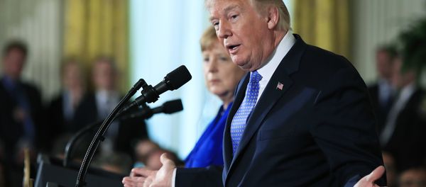 President Donald Trump with German Chancellor Angela Merkel speaks during a news conference in the East Room of the White House in Washington, Friday, April 27, 2018 President Donald Trump with German Chancellor Angela Merkel speaks during a news conference in the East Room of the White House in Washington, Friday, April 27, 2018 - Sputnik International