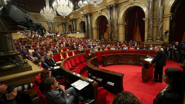 Candidate for the regional presidency of Catalonia, Quim Torra, delivers a speech at the start of an investiture debate at the regional parliament in Barcelona, Spain, May 14, 2018 - Sputnik International