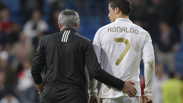 Real Madrid's coach Jose Mourinho from Portugal embraces Cristiano Ronaldo from Portugal after a Champions League round of 16, second leg soccer match against CSKA Moscow's at the Santiago Bernabeu Stadium, in Madrid, Wednesday, March 14, 2012 Real Madrid's coach Jose Mourinho from Portugal embraces Cristiano Ronaldo from Portugal after a Champions League round of 16, second leg soccer match against CSKA Moscow's at the Santiago Bernabeu Stadium, in Madrid, Wednesday, March 14, 2012 - Sputnik International