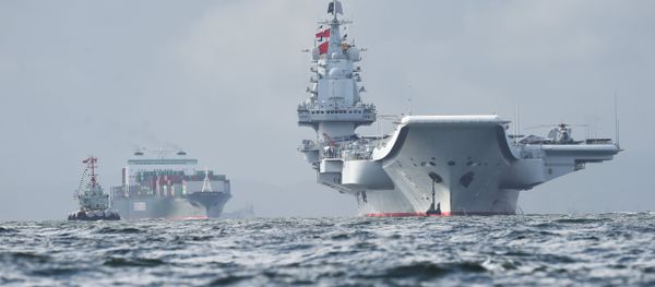 China's sole aircraft carrier, the Liaoning (R), arrives in Hong Kong waters on July 7, 2017, less than a week after a high-profile visit by president Xi Jinping - Sputnik International