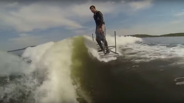 Guy Wakeboards with Table - Sputnik International
