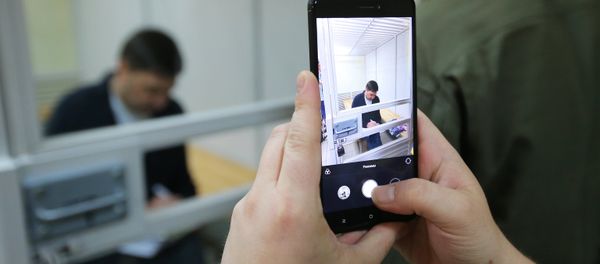 Head of the RIA Novosti Ukraine website Kirill Vyshinsky during a hearing of an appeal against his arrest at the Kherson Court Head of the RIA Novosti Ukraine website Kirill Vyshinsky during a hearing of an appeal against his arrest at the Kherson Court - Sputnik International