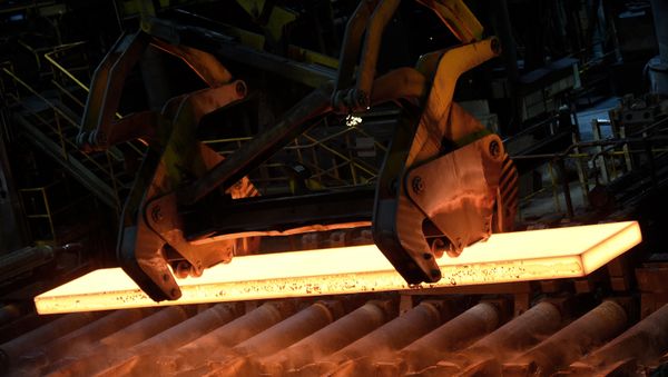 Steel is moved by a steel-worker in a mill at the plant of German steel company Salzgitter AG in Salzgitter, Lower Saxony on March 3, 2016 Steel is moved by a steel-worker in a mill at the plant of German steel company Salzgitter AG in Salzgitter, Lower Saxony on March 3, 2016 - Sputnik International