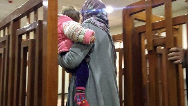 This file photo taken on February 19, 2018, shows French Jihadist Melina Boughedir carrying her son as she arrives to court in the Iraqi capital Baghdad - Sputnik International