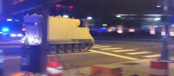An armoured personnel carrier (APC), which was purpotedly stolen, drives along a street in Richmond, Virginia, U.S. June 5, 2018, in this still image taken from a video obtained from social media - Sputnik International