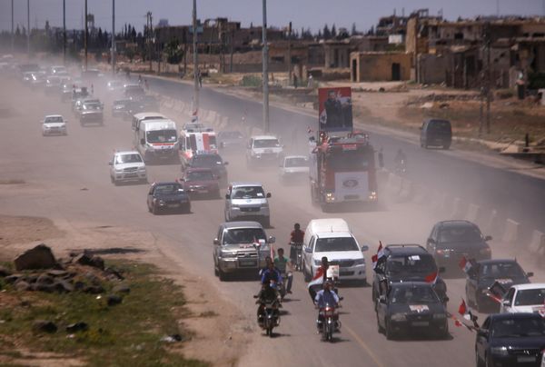 People celebrate the re-opening of the road between Homs and Hama in Talbisi, Syria, June 6, 2018 People celebrate the re-opening of the road between Homs and Hama in Talbisi, Syria, June 6, 2018 - Sputnik International
