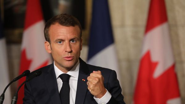 French President Emmanuel Macron holds a joint press conference with Canadian Prime Minister Justin Trudeau at Parliament on June 7, 2018 in Ottawa - Sputnik International