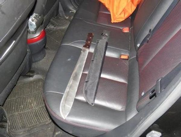 A machete and its sheath, found in the back of a Nissan in which the gang were traveling in west London - Sputnik International