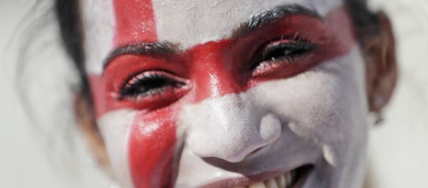 An English soccer fan smiles as she enters the Velodrome stadium ahead of the Euro 2016 Group B soccer match between England and Russia, in Marseille, France, Saturday, June 11, 2016. - Sputnik International