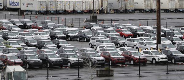 New cars and cargo containers are shown in a staging area, Friday, April 6, 2018, at the Port of Tacoma in Tacoma, Wash. New cars and cargo containers are shown in a staging area, Friday, April 6, 2018, at the Port of Tacoma in Tacoma, Wash. - Sputnik International