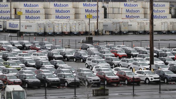 New cars and cargo containers are shown in a staging area, Friday, April 6, 2018, at the Port of Tacoma in Tacoma, Wash. New cars and cargo containers are shown in a staging area, Friday, April 6, 2018, at the Port of Tacoma in Tacoma, Wash. - Sputnik International