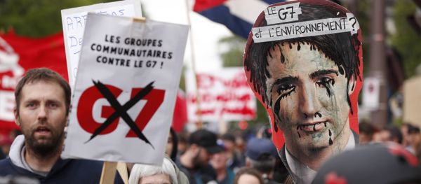 Anti-G7 protestors gather for a demonstration in Quebec City, Quebec, June 7, 2018, on the eve of the leaders' summit Anti-G7 protestors gather for a demonstration in Quebec City, Quebec, June 7, 2018, on the eve of the leaders' summit - Sputnik International