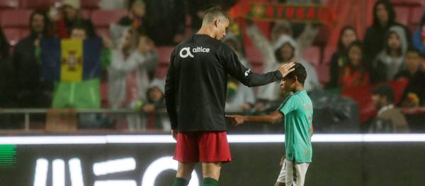 Soccer Football - International Friendly - Portugal vs Algeria - Estadio da Luz, Lisbon, Portugal - June 7, 2018 Portugal's Cristiano Ronaldo with his son after the match Soccer Football - International Friendly - Portugal vs Algeria - Estadio da Luz, Lisbon, Portugal - June 7, 2018 Portugal's Cristiano Ronaldo with his son after the match - Sputnik International