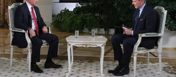 Russian President Vladimir Putin during an interview with Armin Wolf, right, a journalist of the Austrian ORF TV and radio company, at the Kremlin - Sputnik International
