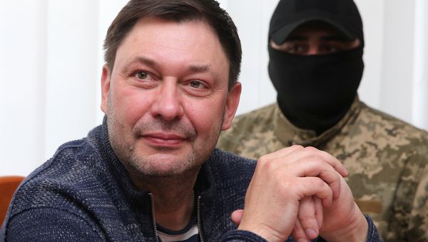 Journalist Kirill Vyshinsky, the director of Russian state news agency RIA Novosti Ukraine, attends a preliminary court hearing in Kherson, Ukraine May 17, 2018 - Sputnik International