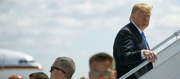 President Donald Trump boards Air Force One for a trip to Singapore to meet with North Korean leader Kim Jong Un, Saturday, June 9, 2018, at Canadian Forces Base Bagotville, in Canada. - Sputnik International