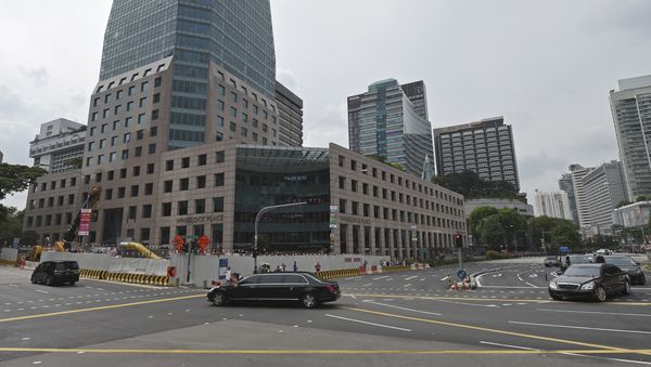 The North Korean Motorcade carrying leader Kim Jong Un travels down Singapore's Orchard Boulevard on its way to the St Regis Hotel Sunday, June 10, 2018. Kim arrived Sunday in Singapore ahead of one of the most unusual summits in recent world history, a sit-down Tuesday with U.S. President Donald Trump - Sputnik International