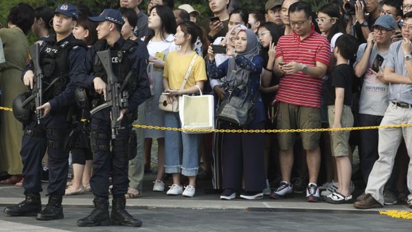 Police officers stand guard as they wait for North Korean leader Kim Jong Un's motorcade at the Istana, or Presidential Palace, in Singapore on Sunday, June 10, 2018, He met with Singapore Prime Minister Lee Hsien Loong ahead of his summit with U.S. leader Donald Trump Police officers stand guard as they wait for North Korean leader Kim Jong Un's motorcade at the Istana, or Presidential Palace, in Singapore on Sunday, June 10, 2018, He met with Singapore Prime Minister Lee Hsien Loong ahead of his summit with U.S. leader Donald Trump - Sputnik International