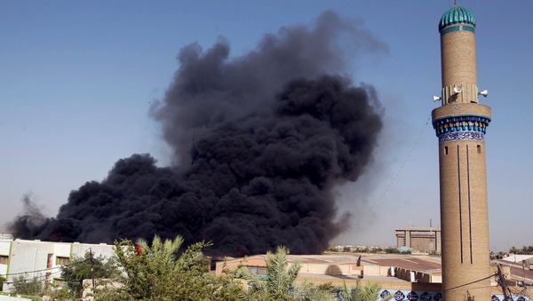 Smoke rises from a storage site in Baghdad, housing ballot boxes from Iraq's May parliamentary election, Iraq June 10, 2018. - Sputnik International