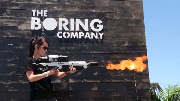 Customer tests out the Not a Flamethrower, manufactured by Elon Musk's Boring Company, in Los Angeles. - Sputnik International