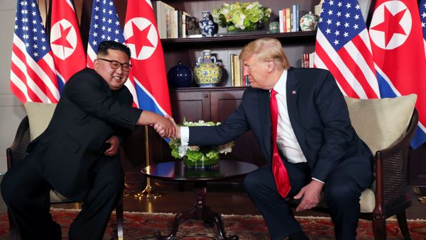 U.S. President Donald Trump shakes hands with North Korea's leader Kim Jong Un before their bilateral meeting at the Capella Hotel on Sentosa island in Singapore June 12, 2018. U.S. President Donald Trump shakes hands with North Korea's leader Kim Jong Un before their bilateral meeting at the Capella Hotel on Sentosa island in Singapore June 12, 2018. - Sputnik International