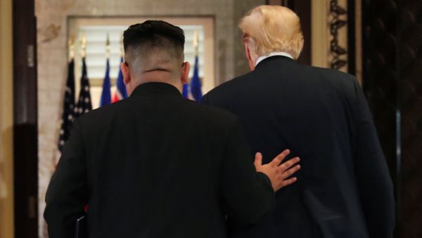 U.S. President Donald Trump and North Korea's leader Kim Jong Un leave after signing documents that acknowledge the progress of the talks and pledge to keep momentum going, after their summit at the Capella Hotel on Sentosa island in Singapore June 12, 2018 U.S. President Donald Trump and North Korea's leader Kim Jong Un leave after signing documents that acknowledge the progress of the talks and pledge to keep momentum going, after their summit at the Capella Hotel on Sentosa island in Singapore June 12, 2018 - Sputnik International
