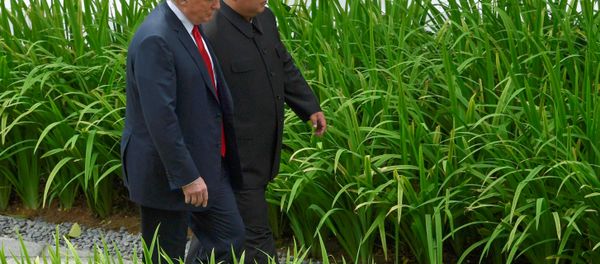U.S. President Donald Trump and North Korean leader Kim Jong Un walk in the Capella Hotel after their working lunch, on Sentosa island in Singapore June 12, 2018 - Sputnik International