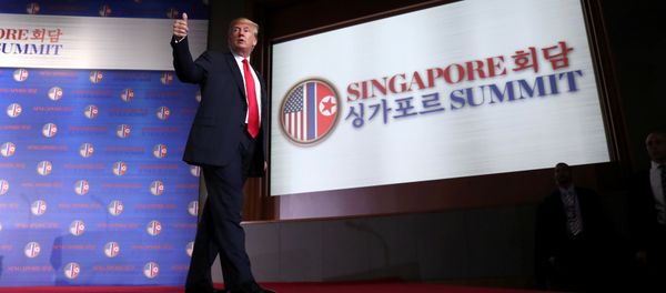 U.S. President Donald Trump gestures after a news conference after his meeting with North Korean leader Kim Jong Un at the Capella Hotel on Sentosa island in Singapore June 12, 2018 - Sputnik International