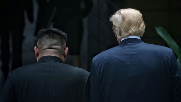 U.S. President Donald Trump walks with North Korean leader Kim Jong Un at the Capella Hotel on Sentosa island in Singapore June 12, 2018 U.S. President Donald Trump walks with North Korean leader Kim Jong Un at the Capella Hotel on Sentosa island in Singapore June 12, 2018 - Sputnik International