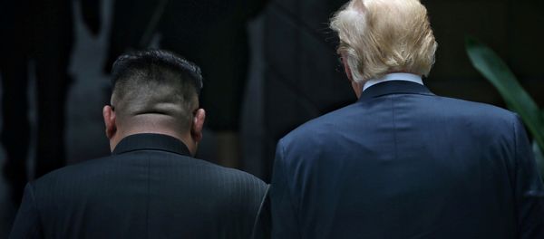 U.S. President Donald Trump walks with North Korean leader Kim Jong Un at the Capella Hotel on Sentosa island in Singapore June 12, 2018 U.S. President Donald Trump walks with North Korean leader Kim Jong Un at the Capella Hotel on Sentosa island in Singapore June 12, 2018 - Sputnik International