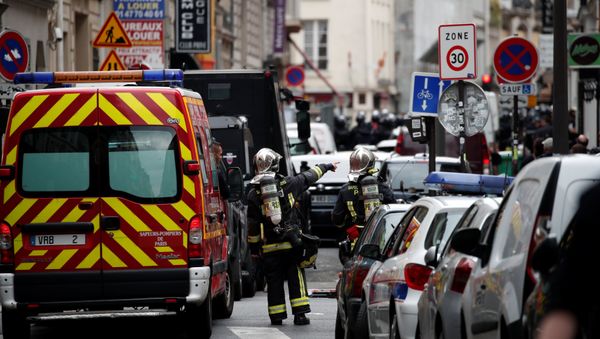 French firemen secure the street as a man has taken two people hostage at a business in Paris, France, June 12, 2018 French firemen secure the street as a man has taken two people hostage at a business in Paris, France, June 12, 2018 - Sputnik International