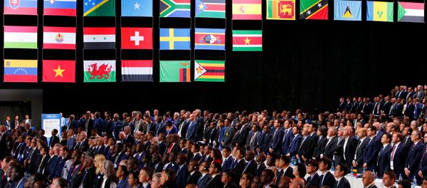 Participants of the 68th FIFA Congress observe a minute of silence in memory of delegates, who recently passed away, in Moscow, Russia June 13, 2018. - Sputnik International