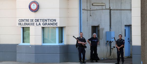 In this file photo taken on June 14, 2017 police stand at the entrance of the prison of Villenauxe-la-Grande, eastern France, where a prison guard was taken hostage by an inmate In this file photo taken on June 14, 2017 police stand at the entrance of the prison of Villenauxe-la-Grande, eastern France, where a prison guard was taken hostage by an inmate - Sputnik International