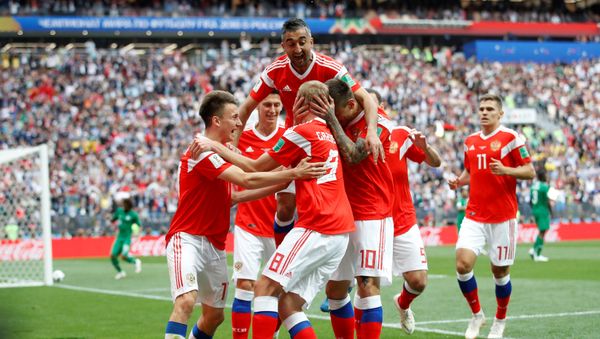 Soccer Football - World Cup - Group A - Russia vs Saudi Arabia - Luzhniki Stadium, Moscow, Russia - June 14, 2018 Russia's Yury Gazinsky celebrates scoring their first goal with team mates - Sputnik International