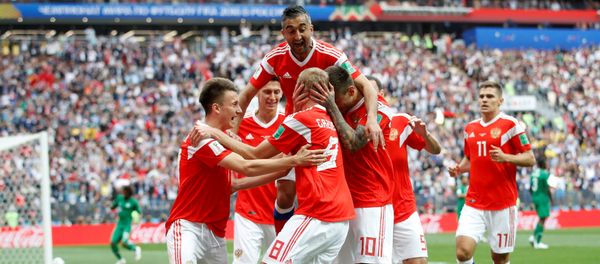Soccer Football - World Cup - Group A - Russia vs Saudi Arabia - Luzhniki Stadium, Moscow, Russia - June 14, 2018 Russia's Yury Gazinsky celebrates scoring their first goal with team mates - Sputnik International